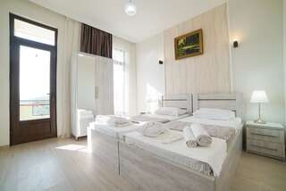 Гостевой дом Guest House Holiday Village Батуми Двухместный номер с 2 отдельными кроватями и видом на горы-3