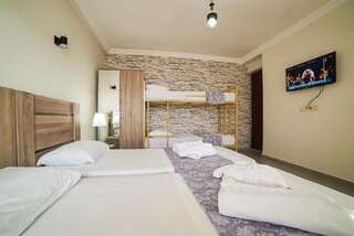 Гостевой дом Guest House Holiday Village Батуми Семейный номер с балконом-3