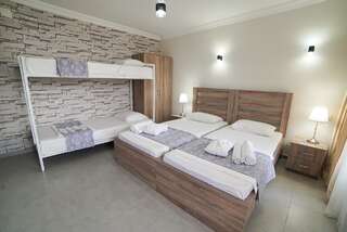 Гостевой дом Guest House Holiday Village Батуми Семейный номер с балконом-10